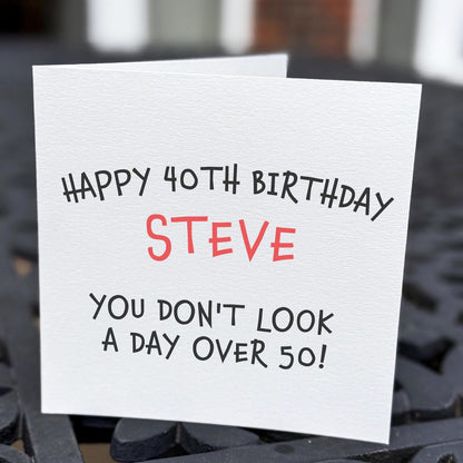 Birthday card with 'Happy 40th Birthday Steve' text on a blurred background