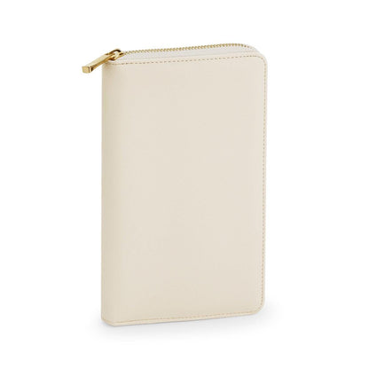 Beige leather wallet with gold zipper on a white background