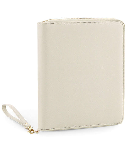 Beige wristlet with a gold zipper on a white background