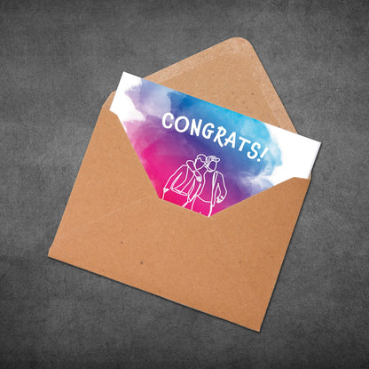 Envelope with a congratulatory card featuring 'CONGRATS!' and a couple illustration on a gray background