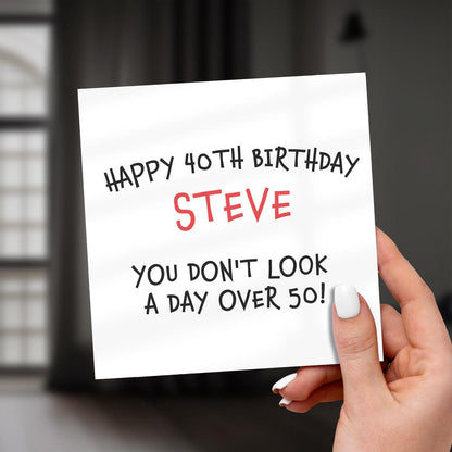 Hand holding a card with 'Happy 40th Birthday Steve' text