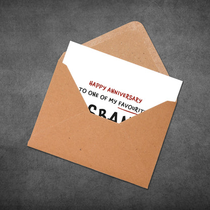 Brown envelope with a white card inside on a gray background