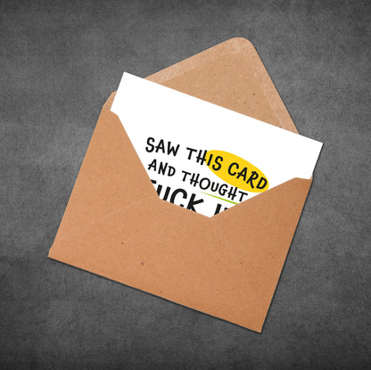 Open brown envelope with a white card inside featuring text and a yellow badge.