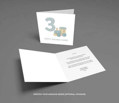 Birthday card with number 3 and train design on a gray background