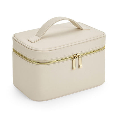 Beige cosmetic bag with gold zipper on a white background