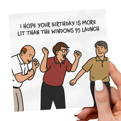 Cartoon illustration with text about Windows 95 launch held by a hand.