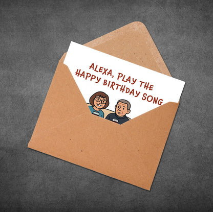 Greeting card with 'Alexa, play the Happy Birthday song' text and cartoon characters in an open brown envelope on a dark gray background.
