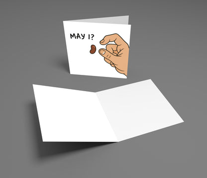 Greeting card with a hand holding a chocolate bar and 'May I?' text on a gray background
