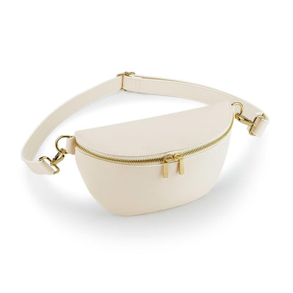 Beige fanny pack with gold zipper and hardware on a white background