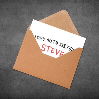 Brown envelope with a birthday card inside on a gray background