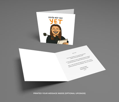 Greeting card with a humorous illustration and text on a gray background