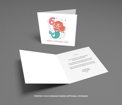 Birthday card with mermaid illustration and envelope on a gray background
