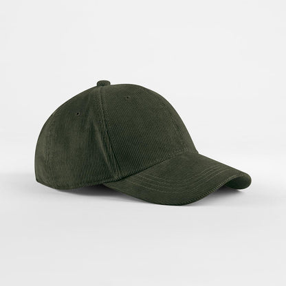 Green corduroy cap on a white background