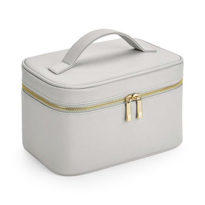 Light gray cosmetic bag with gold zipper on a white background