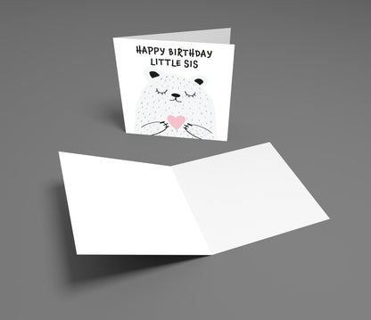 Greeting card with a cat illustration and 'Happy Birthday Little Sis' text on a gray background