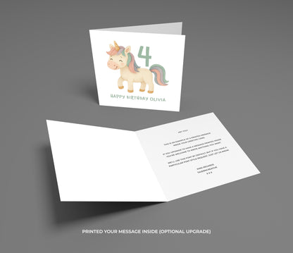 Birthday card with unicorn illustration and envelope on a gray background