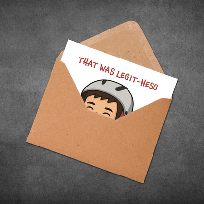Card with a cartoon character and text 'THAT WAS LEGIT-NESS' in an open brown envelope on a dark gray background.
