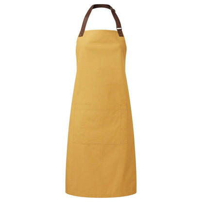 Yellow apron with brown straps on a white background