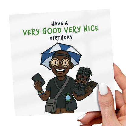 Greeting card with cartoon character holding an umbrella and phone, text 'Have a Very Good Very Nice Birthday'.