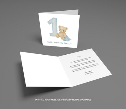 Birthday card with teddy bear and number one design on a gray background
