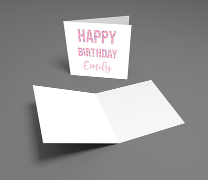 White birthday card with 'Happy Birthday Emily' text on a gray background