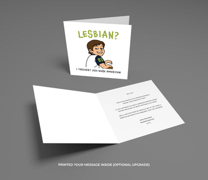 Card with cartoon character and text 'LESBIAN? I Thought You Were American' on a gray background