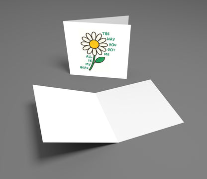 Greeting card with a daisy illustration and text on a gray background