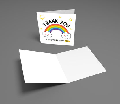 Greeting card with rainbow and clouds design on a gray background
