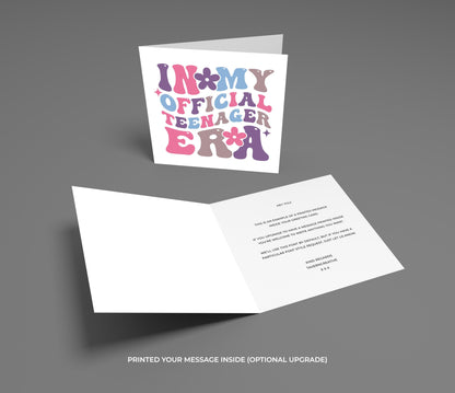 Greeting card with colorful text and an open card revealing a printed message on a gray background