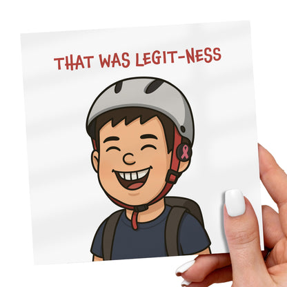 Cartoon character wearing a helmet with text 'THAT WAS LEGIT-NESS' held by a hand.