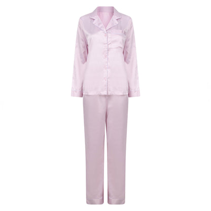 Pink pajama set on a white background