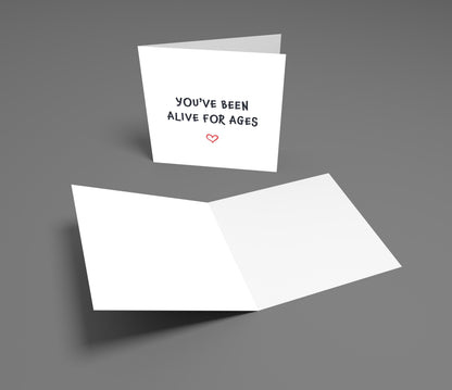White greeting card with text on a gray background