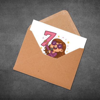 Card with a cartoon character holding a pink number seven, inside a brown envelope on a dark gray background.