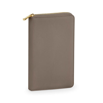 Brown leather wallet with gold zipper on a white background
