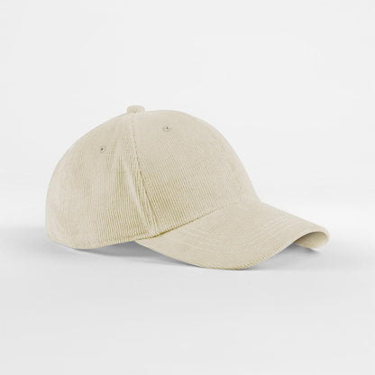 Beige corduroy cap on a light gray background