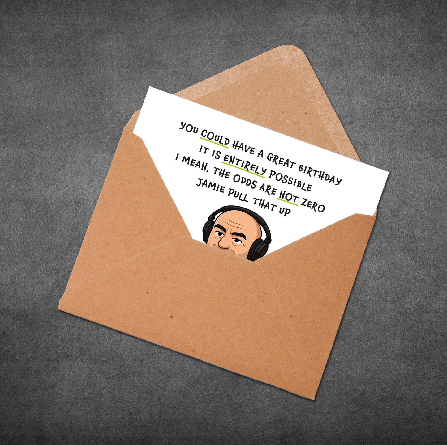 Greeting card with humorous message and cartoon character in an open envelope on a dark background