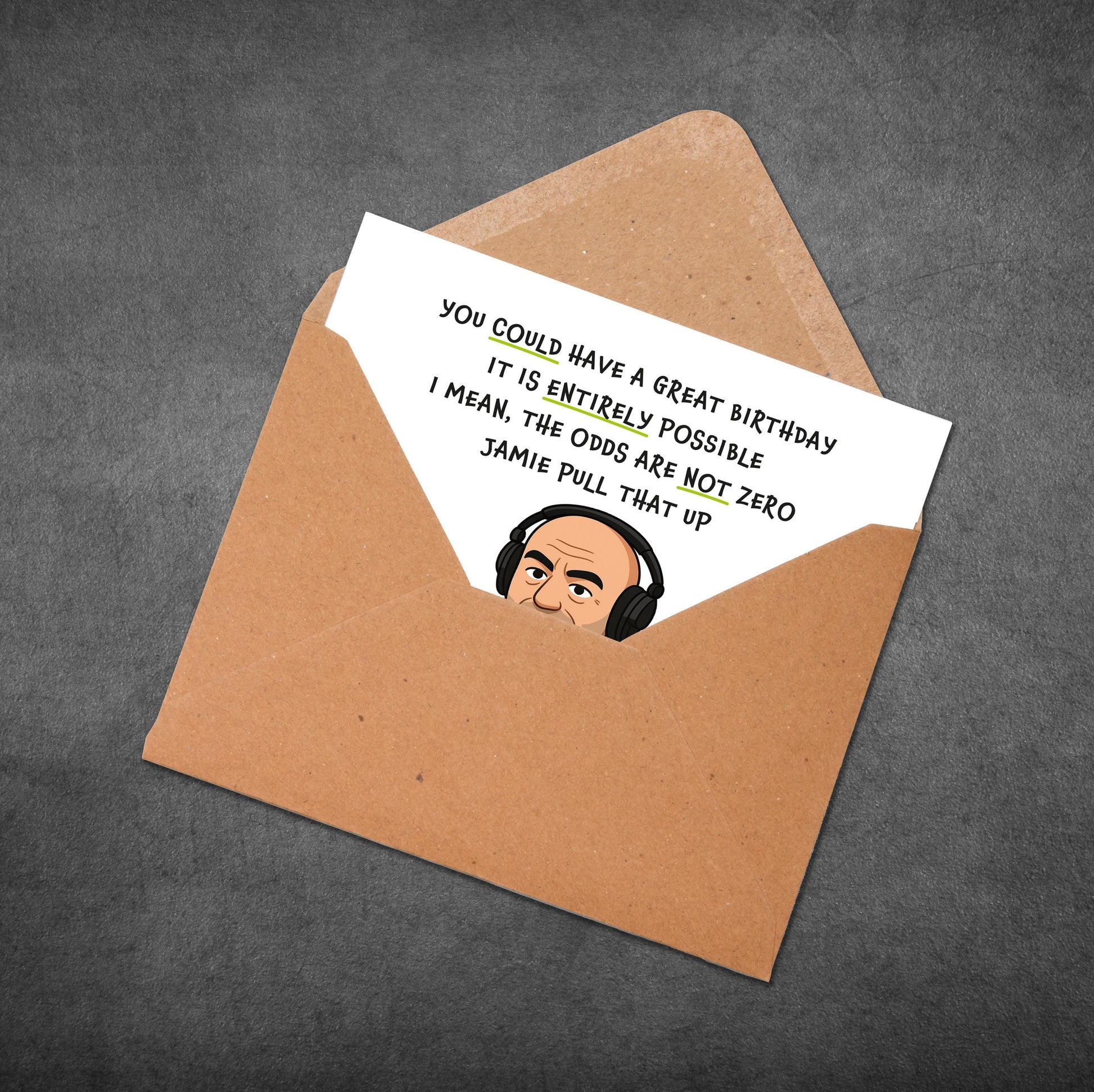 Greeting card with humorous message and cartoon character in an open envelope on a dark background