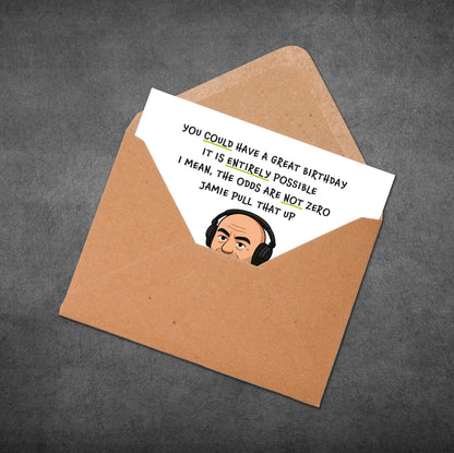 Greeting card with humorous message and cartoon character in an open envelope on a dark background