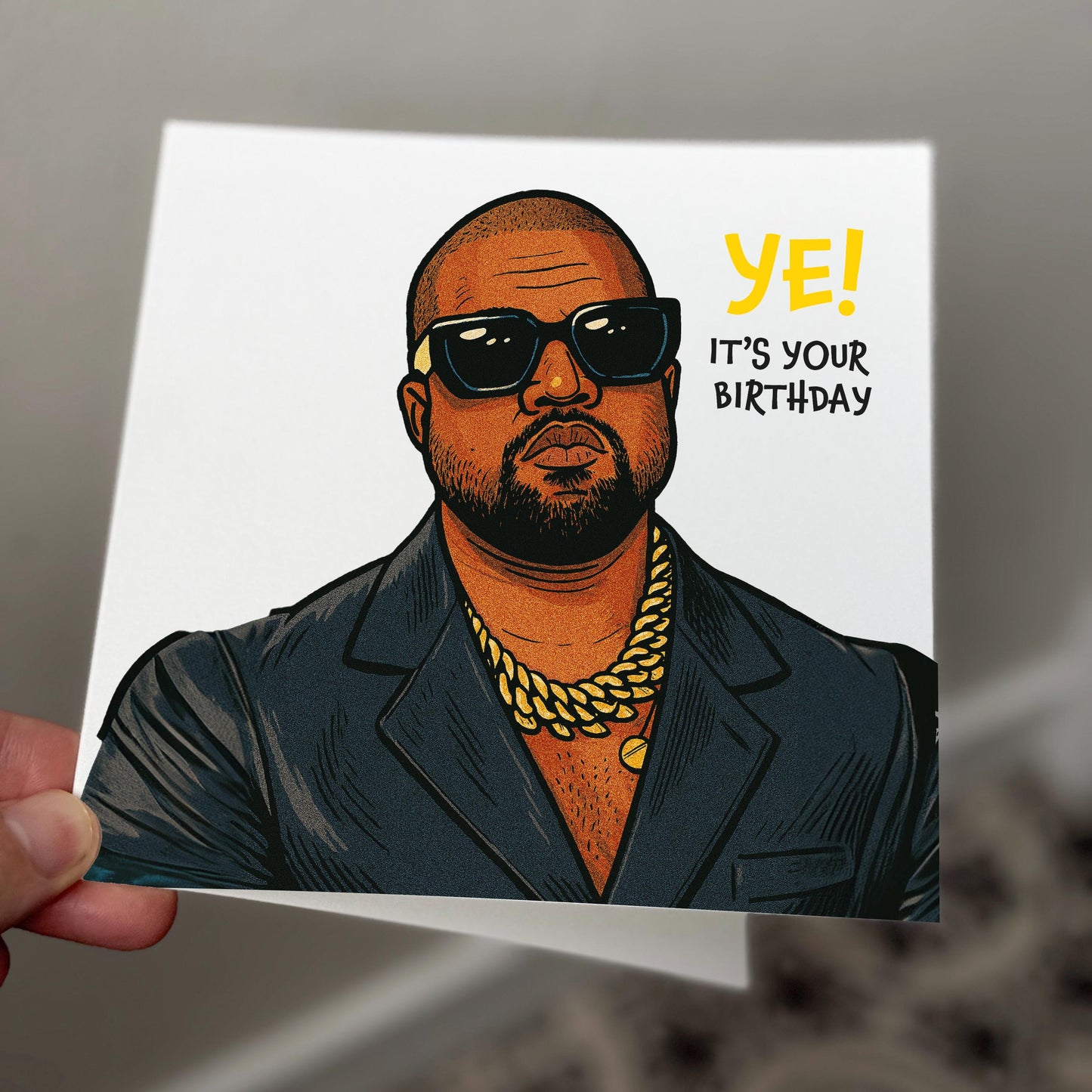 Card with a stylized illustration of a person wearing sunglasses and a suit, with 'YE! It's your birthday' text.