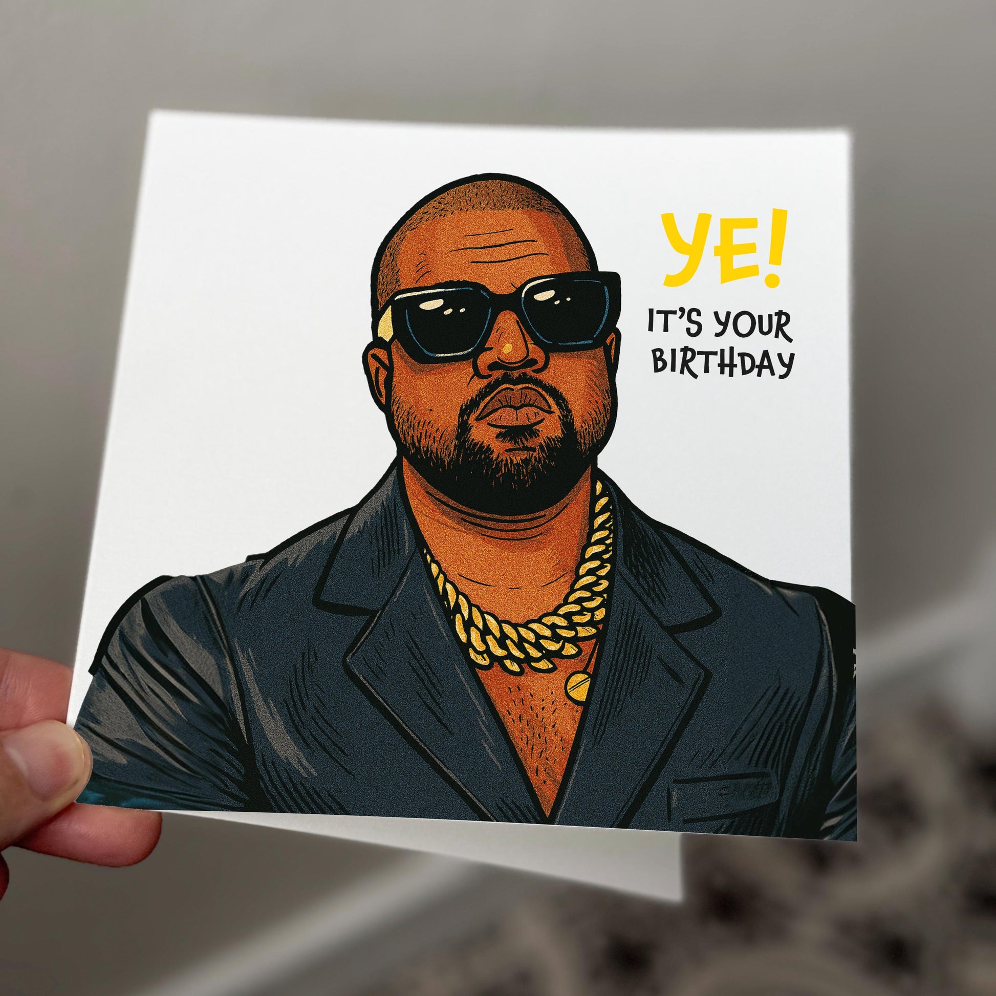 Card with a stylized illustration of a person wearing sunglasses and a suit, with 'YE! It's your birthday' text.