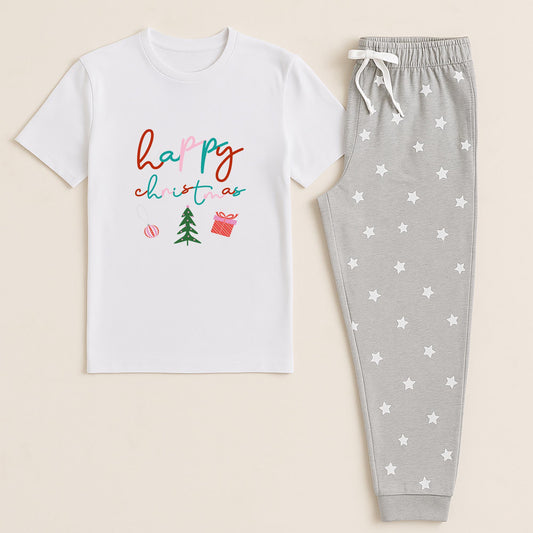 White t-shirt with 'Happy Christmas' text and gray pants with star pattern on a beige background